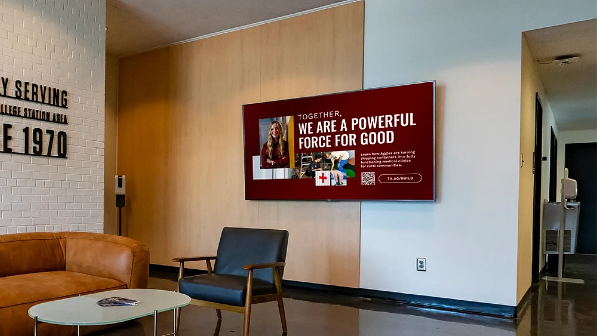 University campus with digital signage screens showing event schedules, announcements, and wayfinding